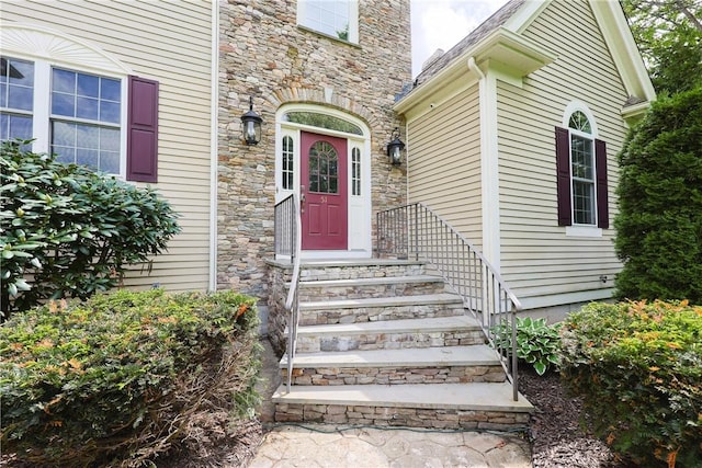51 Reservoir Rd, Cumberland, RI 02864 - view of exterior entry featuring stone siding