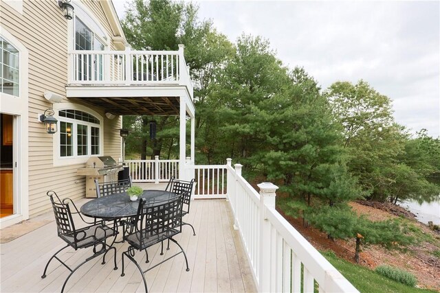 51 Reservoir Rd, Cumberland, RI 02864 - deck with outdoor dining area and a grill