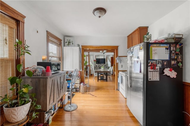 93 Pleasant St, Cranston, RI 02910 - kitchen with appliances with stainless steel finishes, light wood-style flooring, and brown cabinetry