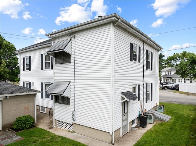 93 Pleasant St, Cranston, RI 02910 - view of property exterior featuring a yard