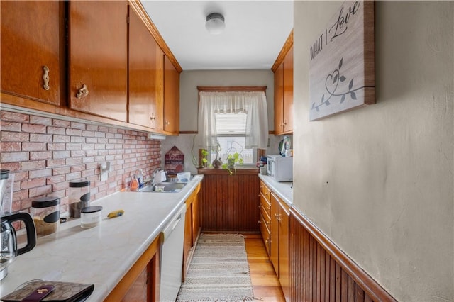 93 Pleasant St, Cranston, RI 02910 - kitchen with a sink, white appliances, brown cabinetry, and light countertops