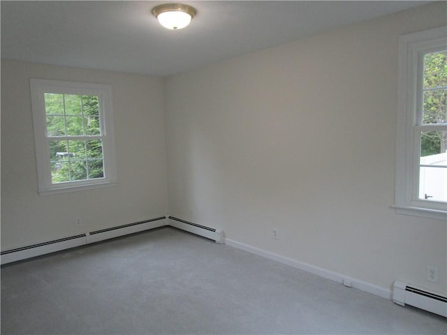 524 Middle Rd, East Greenwich, RI 02818 - carpeted empty room featuring baseboard heating, healthy amount of natural light, and baseboards