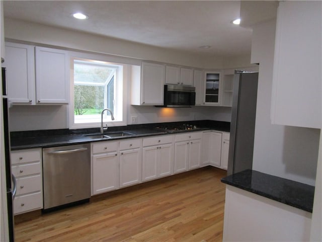 524 Middle Rd, East Greenwich, RI 02818 - kitchen featuring stainless steel appliances, a sink, light wood-style flooring, white cabinetry, and recessed lighting