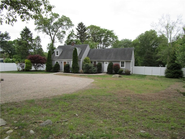 524 Middle Rd, East Greenwich, RI 02818 - cape cod-style house with gravel driveway and a chimney