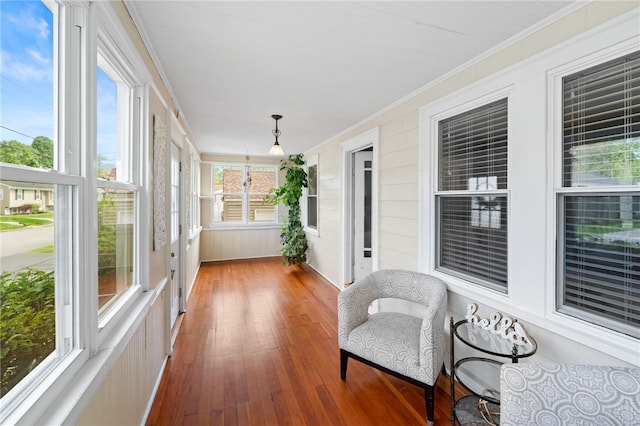 39 Sampson Ave, North Providence, RI 02911 - sunroom / solarium featuring crown molding and hardwood / wood-style floors