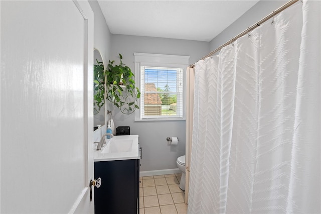 39 Sampson Ave, North Providence, RI 02911 - bathroom featuring vanity, toilet, tile patterned floors, baseboards, and a shower with shower curtain