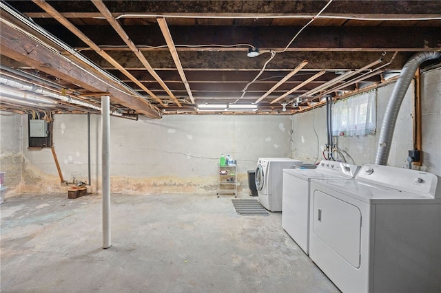 39 Sampson Ave, North Providence, RI 02911 - unfinished below grade area featuring washer and dryer and electric panel