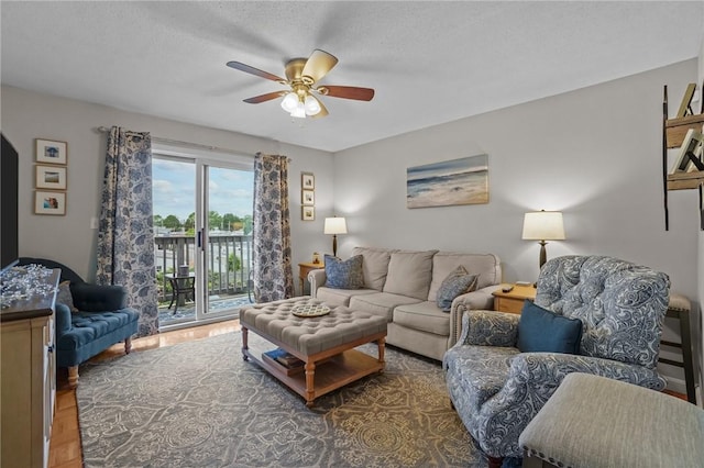 724 Beverage Hill Ave Unit 304, Pawtucket, RI 02861 - living room with a ceiling fan, wood finished floors, and a textured ceiling