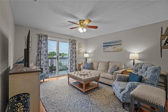 724 Beverage Hill Ave Unit 304, Pawtucket, RI 02861 - living area with ceiling fan and a textured ceiling