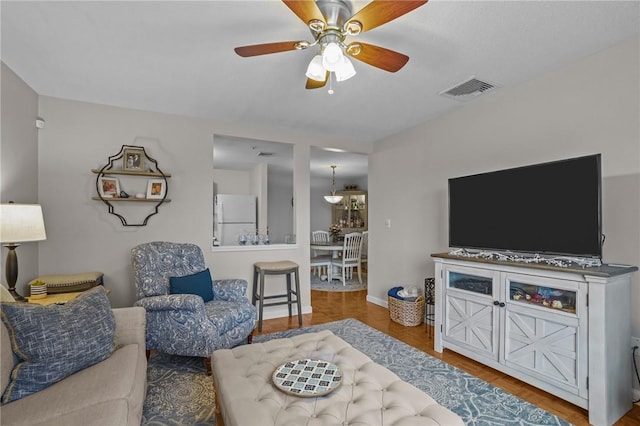 724 Beverage Hill Ave Unit 304, Pawtucket, RI 02861 - living area with ceiling fan and wood finished floors