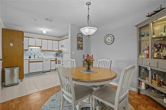 724 Beverage Hill Ave Unit 304, Pawtucket, RI 02861 - dining area featuring baseboards