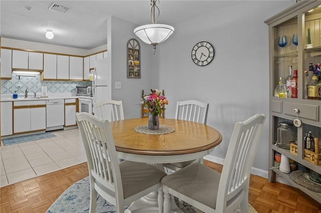 724 Beverage Hill Ave Unit 304, Pawtucket, RI 02861 - dining area with baseboards