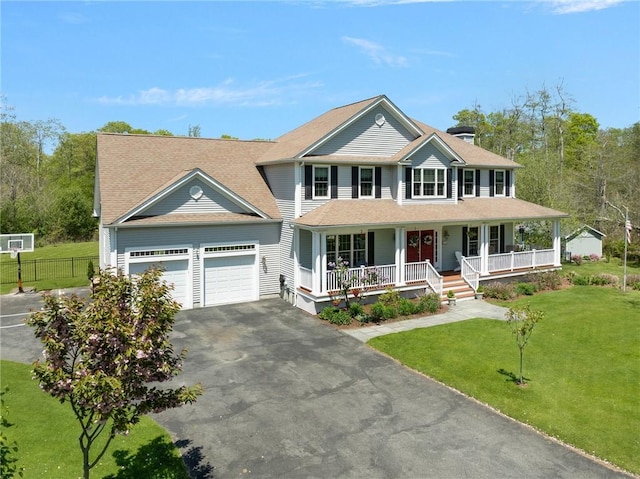 114 Teaberry Dr, Tiverton, RI 02878 - colonial house with covered porch, an attached garage, and asphalt driveway
