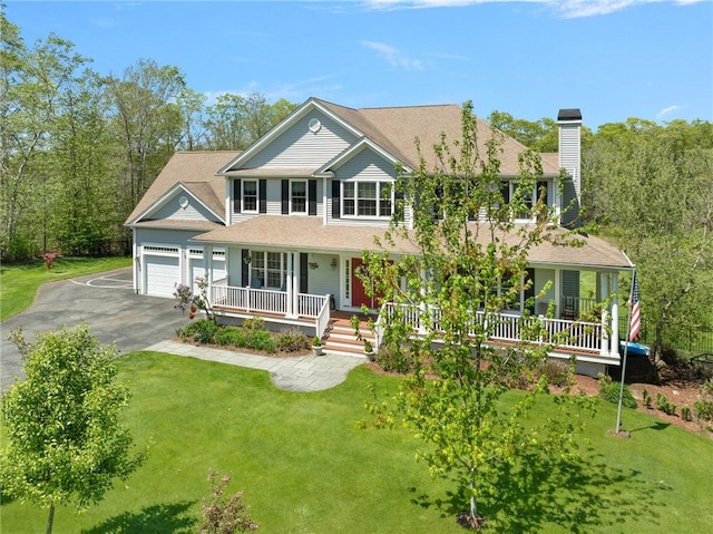 114 Teaberry Dr, Tiverton, RI 02878 - colonial-style house with covered porch, a chimney, asphalt driveway, a garage, and a front yard