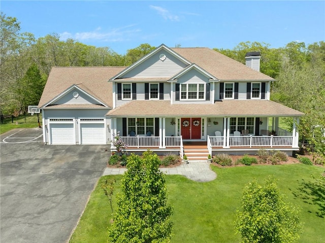 114 Teaberry Dr, Tiverton, RI 02878 - colonial-style house featuring driveway, covered porch, a chimney, an attached garage, and a front yard