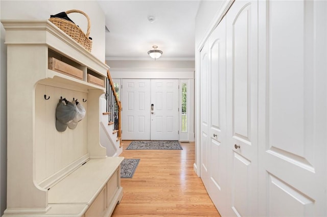 114 Teaberry Dr, Tiverton, RI 02878 - mudroom with light wood-style floors and ornamental molding