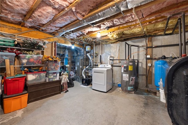 114 Teaberry Dr, Tiverton, RI 02878 - unfinished below grade area with washer / dryer, electric water heater, oil tank, and a water pressure tank