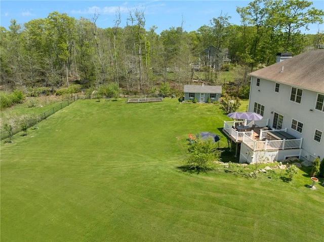 114 Teaberry Dr, Tiverton, RI 02878 - view of green lawn featuring a wooden deck