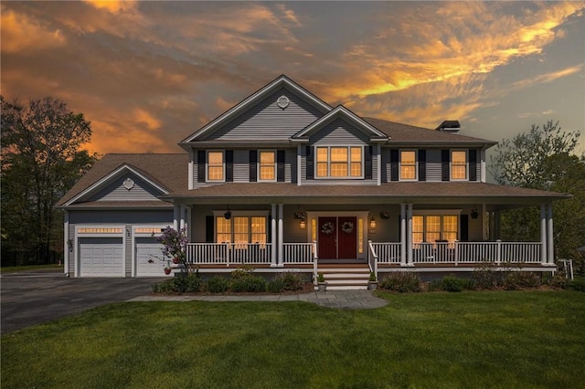 114 Teaberry Dr, Tiverton, RI 02878 - view of front of property featuring a porch, asphalt driveway, a yard, a garage, and a chimney