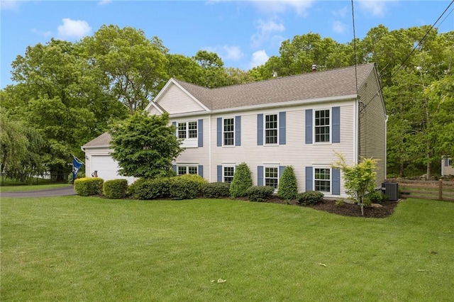 299 S Christopher Ave, Tiverton, RI 02878 - colonial house featuring a garage, central AC unit, and driveway