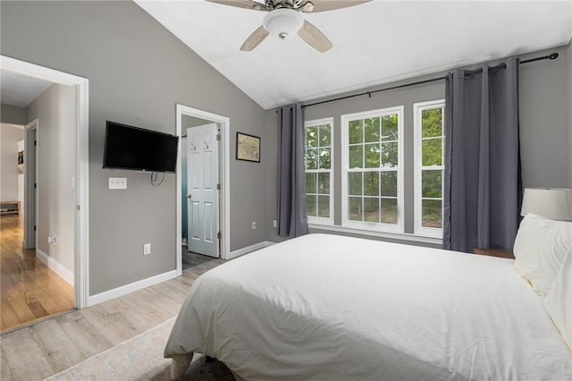 299 S Christopher Ave, Tiverton, RI 02878 - bedroom with wood finished floors, vaulted ceiling, baseboards, and ceiling fan