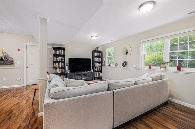 299 S Christopher Ave, Tiverton, RI 02878 - living room with dark wood-type flooring and baseboards