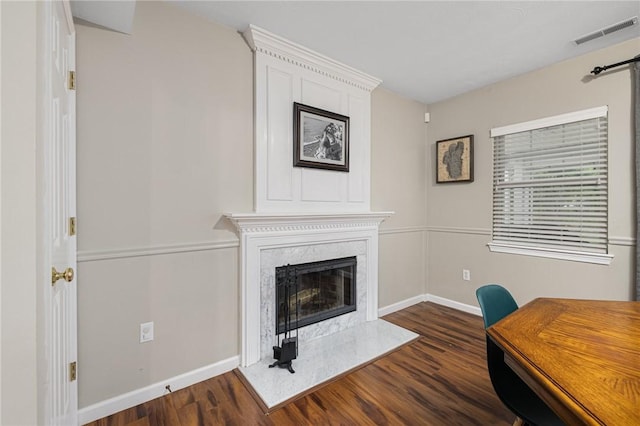 299 S Christopher Ave, Tiverton, RI 02878 - living room featuring baseboards, dark wood-style flooring, and a premium fireplace