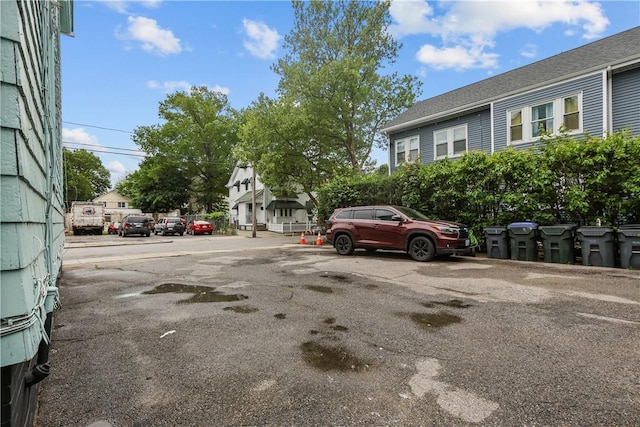 1413 Broad St, Providence, RI 02905 - view of car parking featuring a residential view
