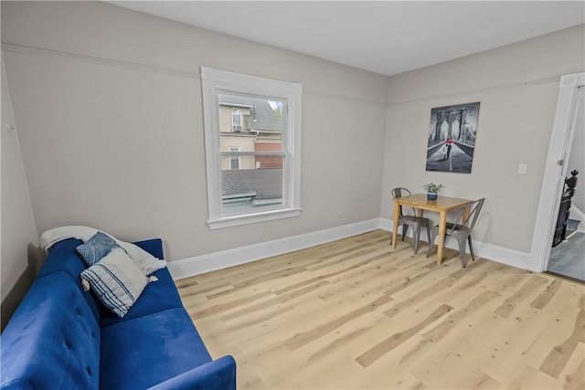 1413 Broad St, Providence, RI 02905 - living area with wood finished floors and baseboards