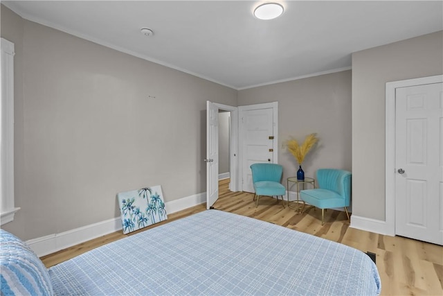 1413 Broad St, Providence, RI 02905 - bedroom featuring wood finished floors, crown molding, and baseboards