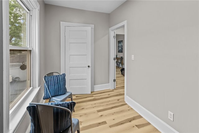 1413 Broad St, Providence, RI 02905 - sitting room with baseboards and light wood-style flooring
