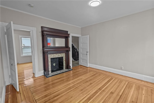 1413 Broad St, Providence, RI 02905 - unfurnished living room with baseboards, wood finished floors, and ornamental molding