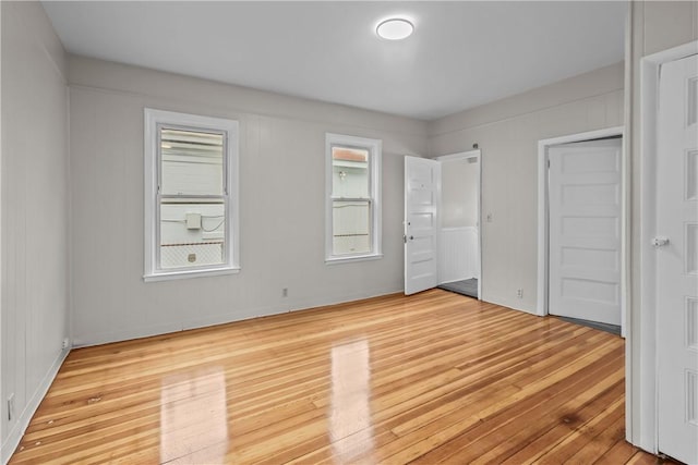 1413 Broad St, Providence, RI 02905 - unfurnished bedroom featuring wood finished floors