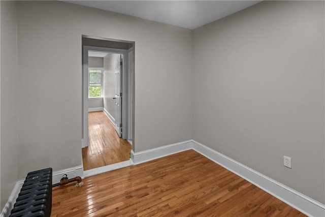 1413 Broad St, Providence, RI 02905 - empty room with wood-type flooring and baseboards