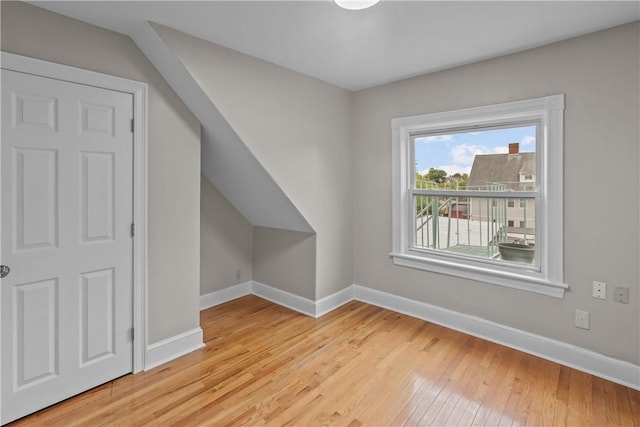 1413 Broad St, Providence, RI 02905 - additional living space with wood-type flooring and baseboards