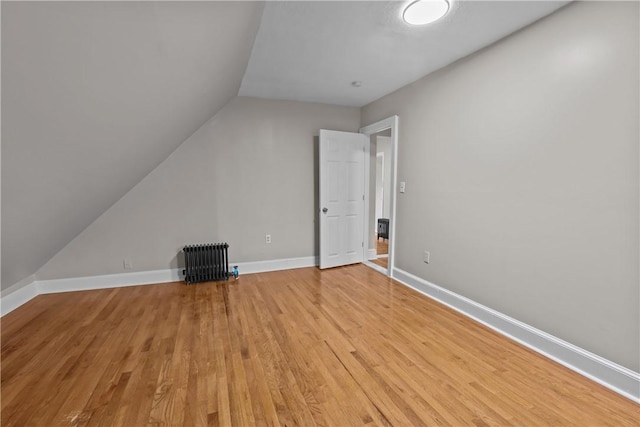 1413 Broad St, Providence, RI 02905 - bonus room featuring light wood-style floors, vaulted ceiling, and baseboards