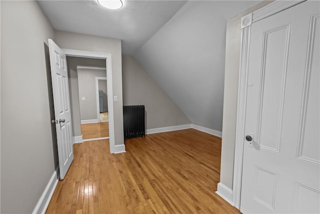 1413 Broad St, Providence, RI 02905 - bonus room with light wood-style floors, baseboards, and lofted ceiling