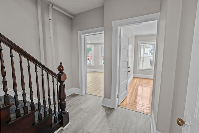 1413 Broad St, Providence, RI 02905 - entrance foyer featuring wood finished floors, baseboards, and stairway