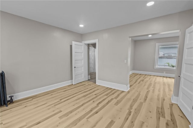 1413 Broad St, Providence, RI 02905 - unfurnished bedroom with recessed lighting, light wood-style flooring, and baseboards