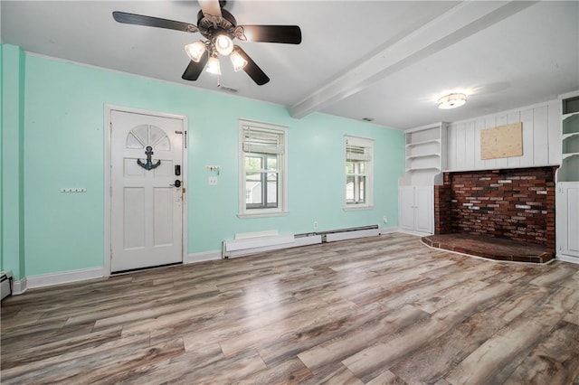 130 Alice Ave, Woonsocket, RI 02895 - unfurnished living room featuring beamed ceiling, wood finished floors, ceiling fan, and baseboards