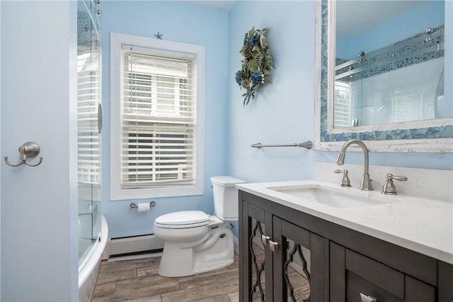 130 Alice Ave, Woonsocket, RI 02895 - bathroom with baseboard heating, toilet, an enclosed shower, vanity, and wood finished floors