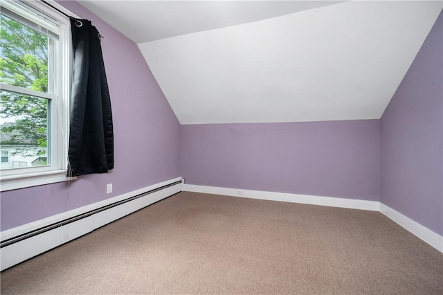 130 Alice Ave, Woonsocket, RI 02895 - bonus room featuring a baseboard heating unit, vaulted ceiling, carpet flooring, and baseboards
