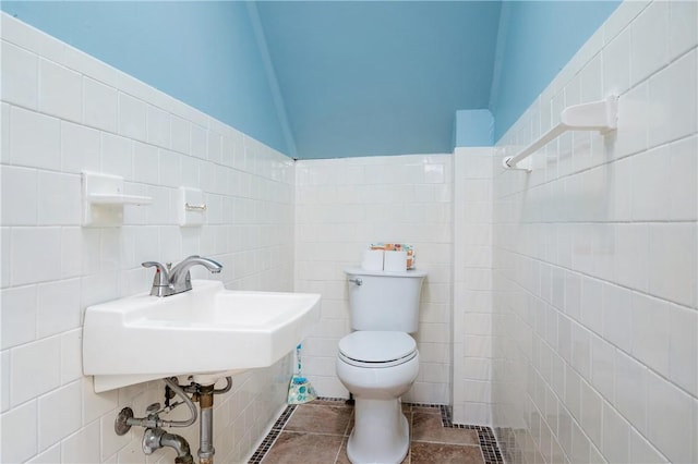 130 Alice Ave, Woonsocket, RI 02895 - bathroom with toilet, tile walls, and a sink
