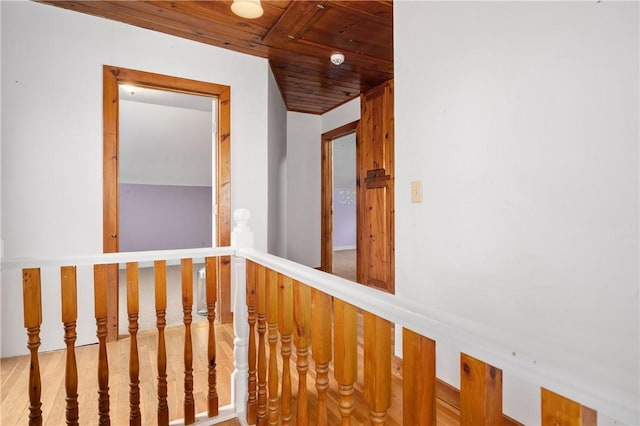 130 Alice Ave, Woonsocket, RI 02895 - hallway featuring wood ceiling and an upstairs landing