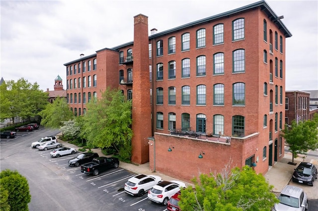 28 Bayley St Unit 304, Pawtucket, RI 02860 - view of building exterior featuring uncovered parking