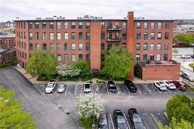 28 Bayley St Unit 304, Pawtucket, RI 02860 - view of building exterior featuring uncovered parking
