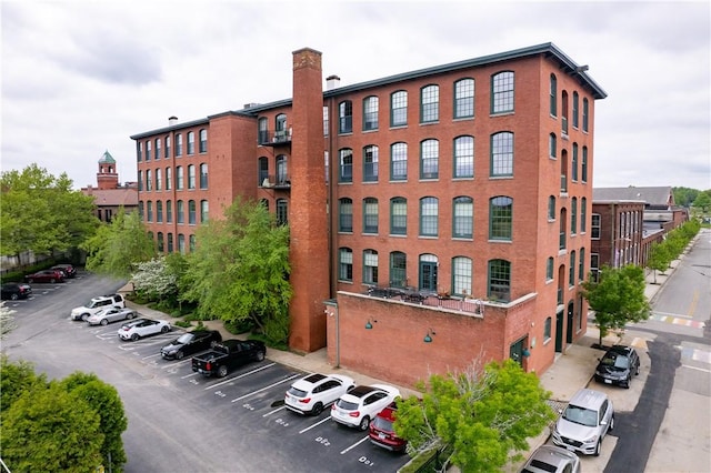 28 Bayley St Unit 304, Pawtucket, RI 02860 - view of building exterior featuring uncovered parking