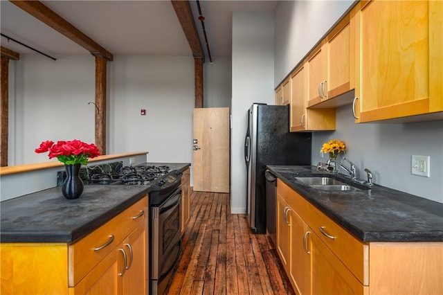 28 Bayley St Unit 304, Pawtucket, RI 02860 - kitchen with stainless steel appliances, a sink, dark wood finished floors, dark countertops, and beamed ceiling