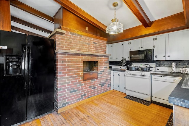 9 Melody Ln, Johnston, RI 02919 - kitchen featuring black appliances, dark countertops, light wood-style flooring, beam ceiling, and backsplash