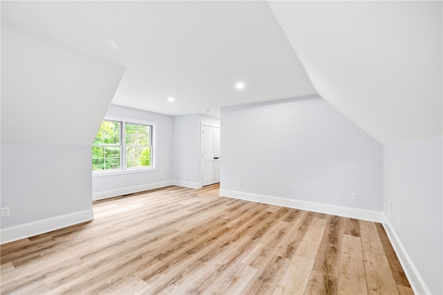 1332 S Rd, South Kingstown, RI 02879 - bonus room featuring vaulted ceiling, wood finished floors, baseboards, and recessed lighting